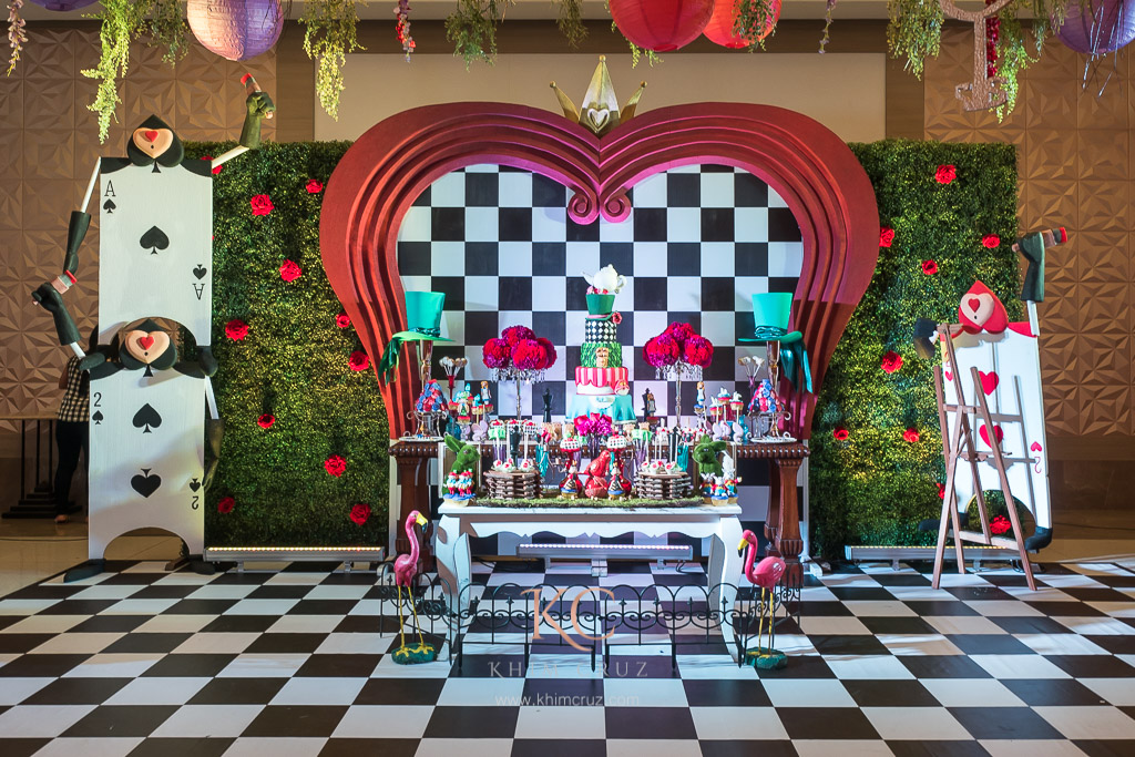 alice in wonderland birthday party decor dessert table setup by Khim Cruz