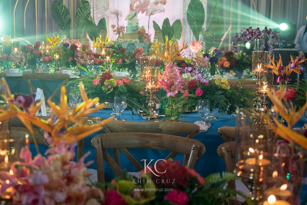 tropical luau wedding table setting centerpieces by Khim Cruz