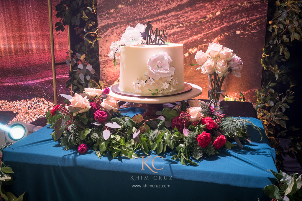 elegant rustic wedding cake floral accent by Khim Cruz