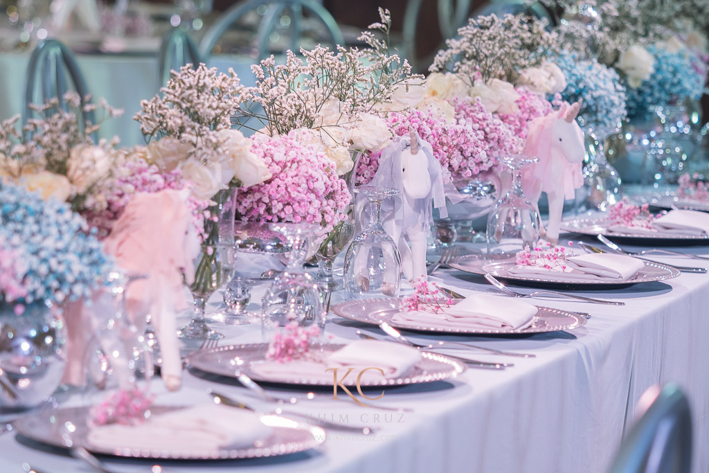 unicorn rainbow head table floral centerpiece