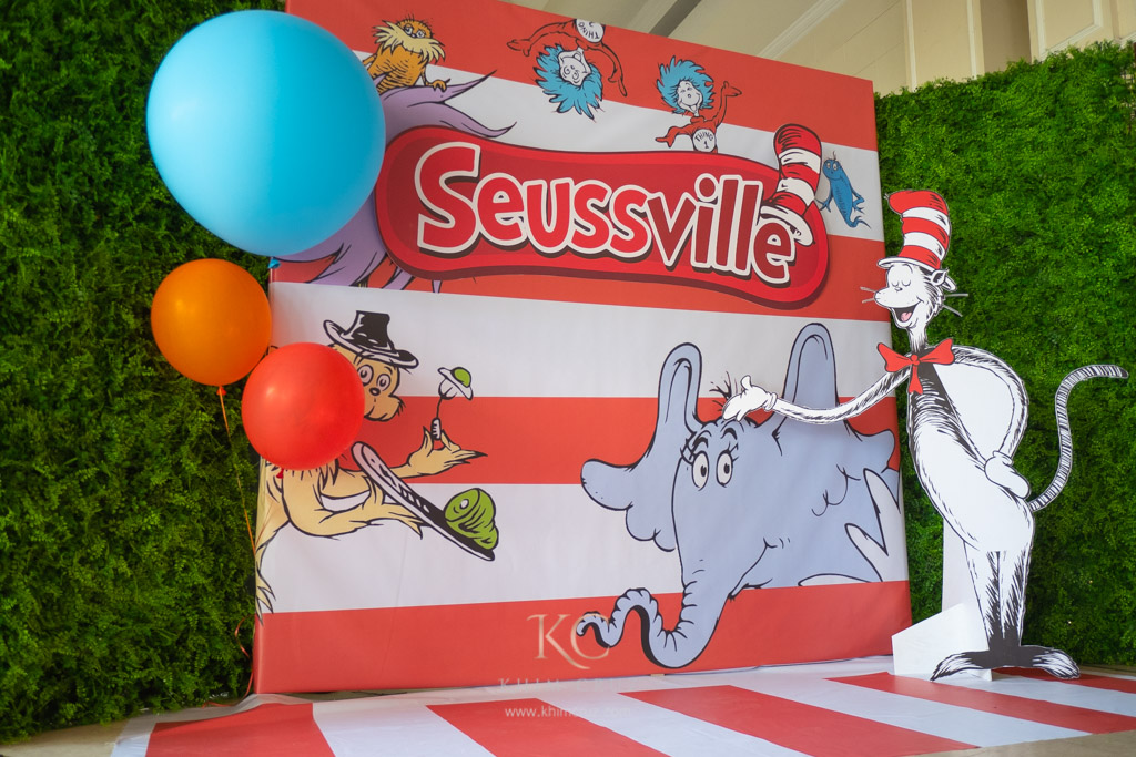 dr. seuss seussville themed birthday party photo wall