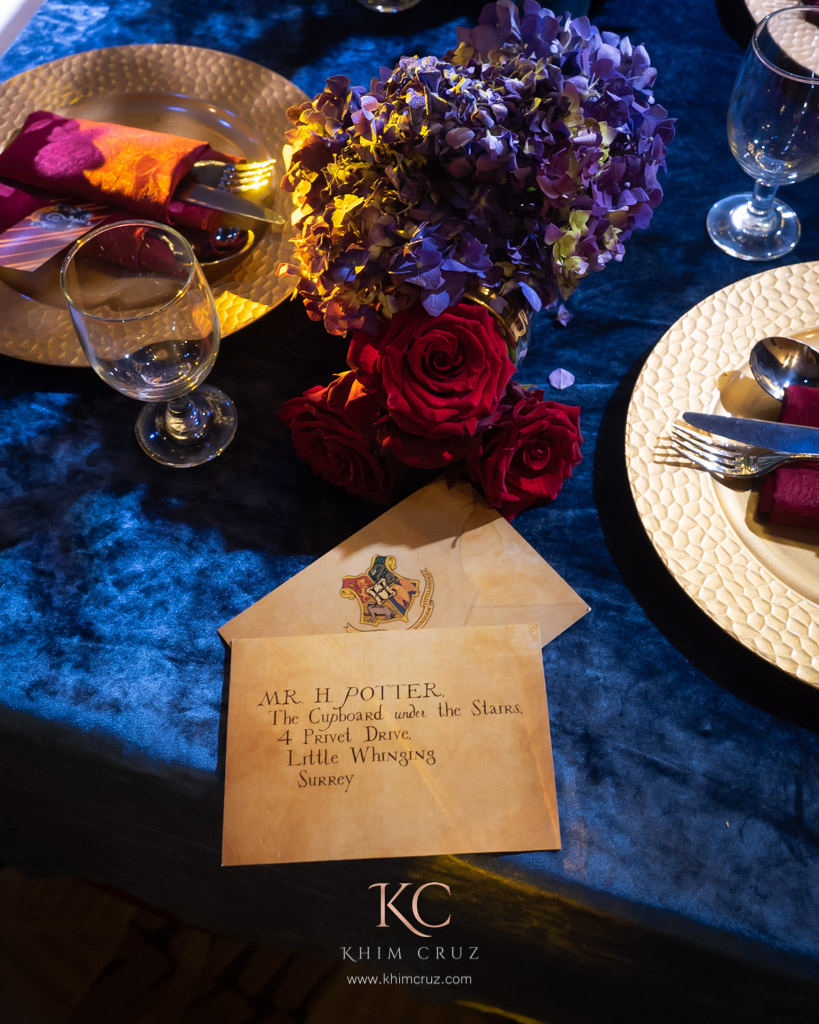 harry potter themed birthday invite floral table detail by Khim Cruz