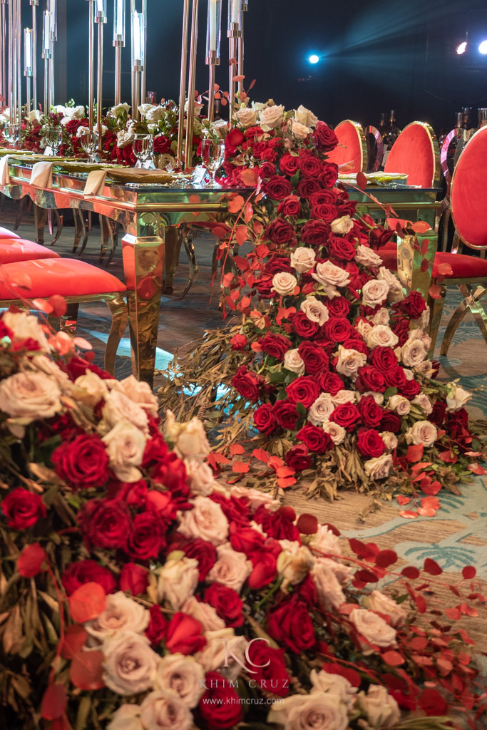 red elegance wedding floral arrangement by Khim Cruz