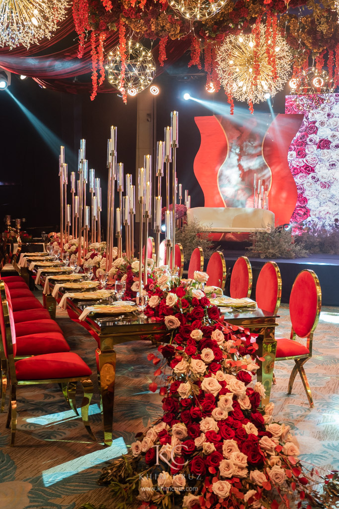 red elegance wedding reception presidential table floral styled by Khim Cruz