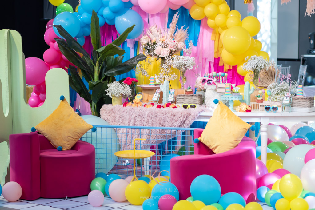 llama themed kids birthday party dessert station with lounge chairs styled by Khim Cruz