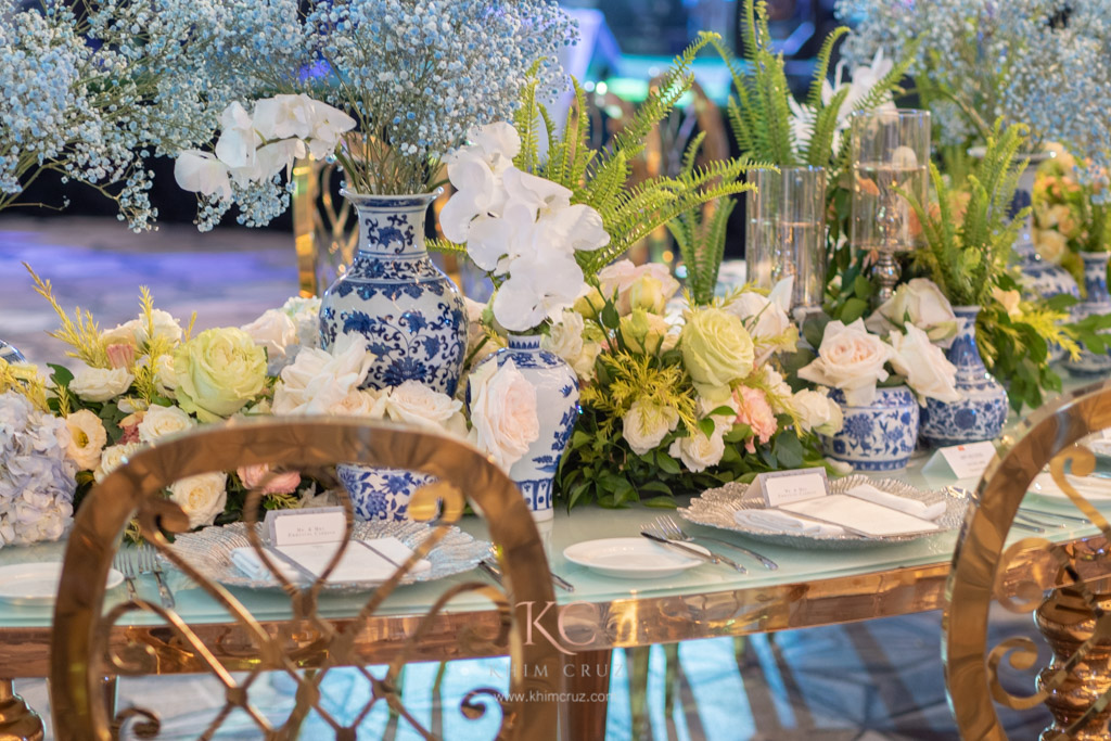 Chinoiserie themed wedding reception head table flowers
