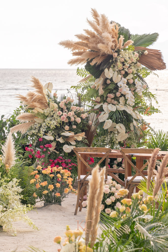 Floral details of a boho beach wedding ceremony