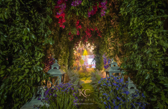 Enchanted garden themed debut entrance tunnel