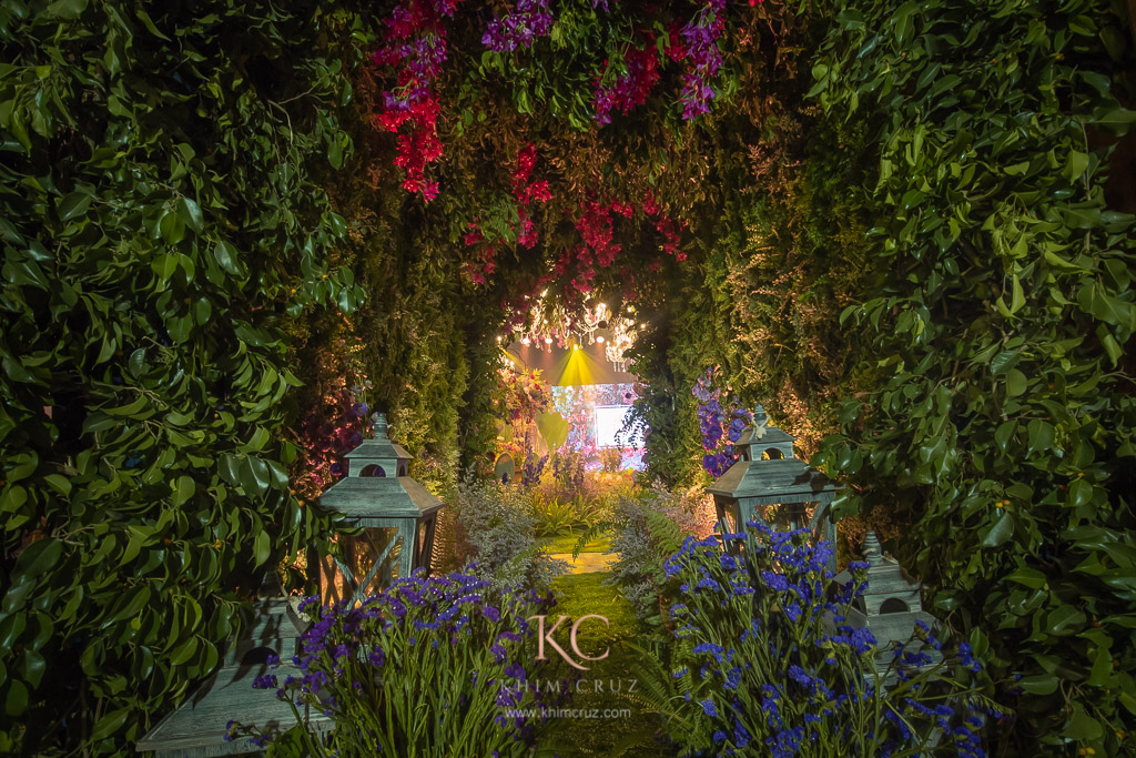 Enchanted garden themed debut entrance tunnel