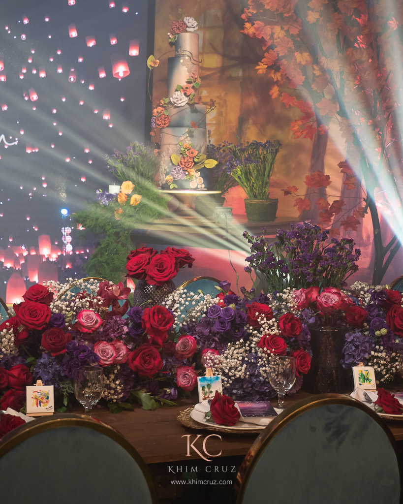 mystic garden debut floral centerpiece and cake