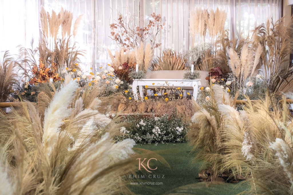 autumn boho wedding ceremony setup by Khim Cruz