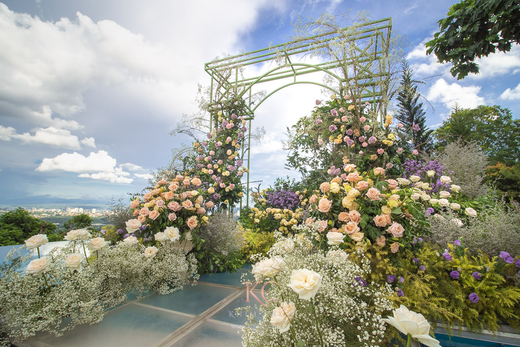 garden setup intimate wedding ceremony floral arch by Khim Cruz