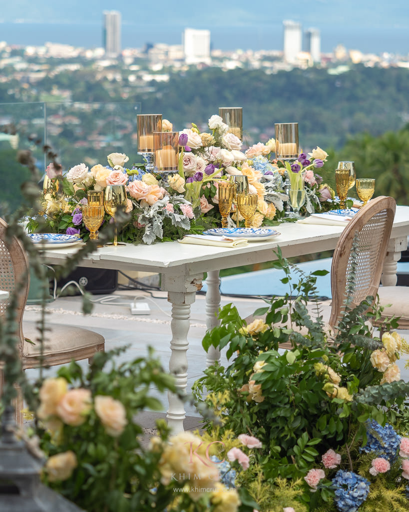 garden setup intimate wedding reception floral table centerpiece decoration by Khim Cruz