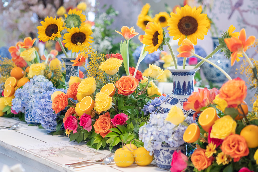 Chinoiserie lemon and orange themed party floral centerpieces by Khim Cruz