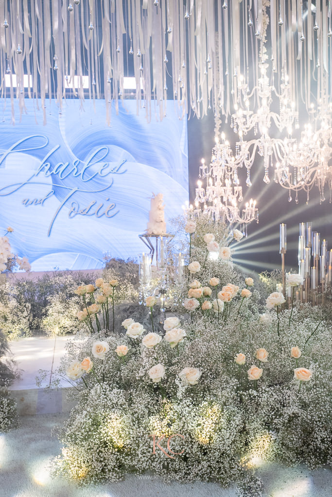 timeless elegance wedding reception of Charles & Tosie floral stage details decor by Khim Cruz