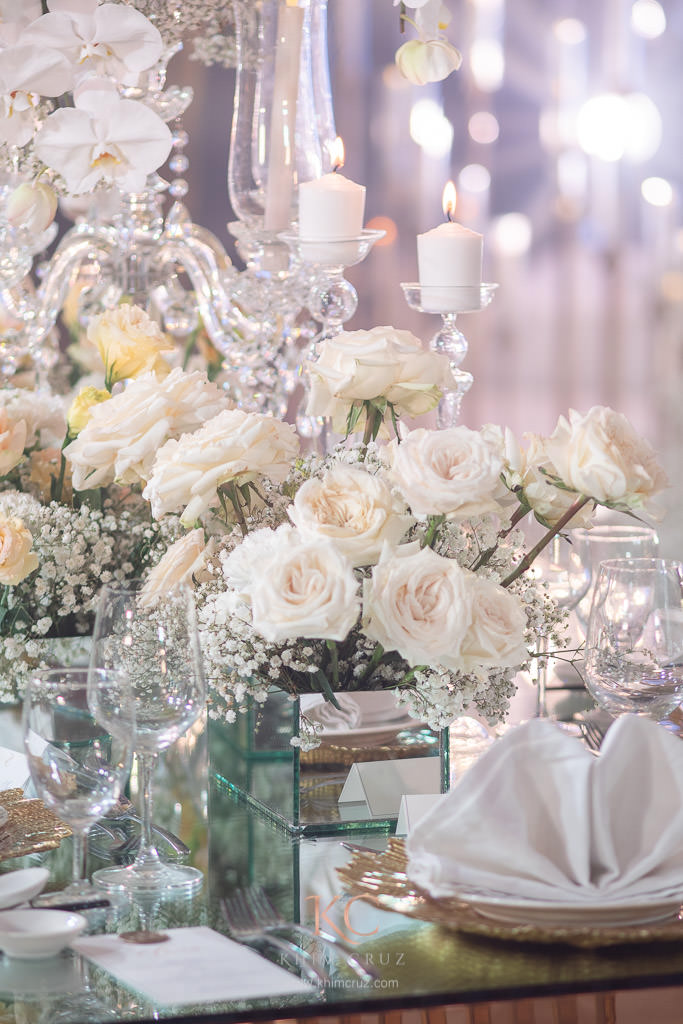 timeless elegance wedding reception of Charles & Tosie table centerpiece flowers by Khim Cruz