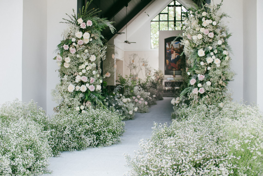 wedding ceremony of Kirk and Michele entrance and aisle floral design by Khim Cruz