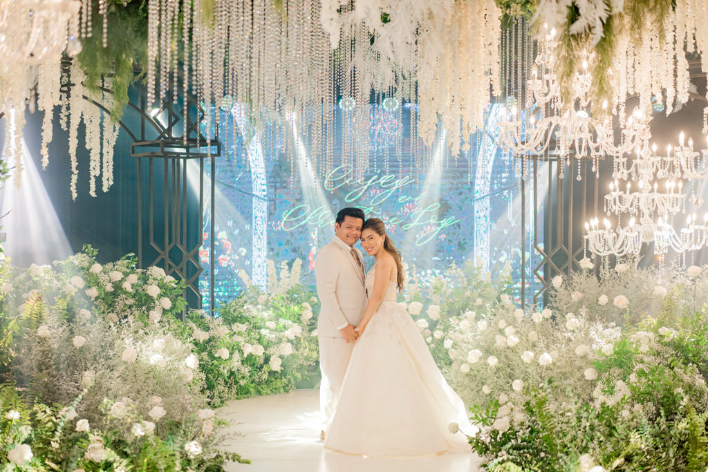 florals and lush greens rustic elegance wedding of Ceejay and Christine couple on stage styled by Khim Cruz