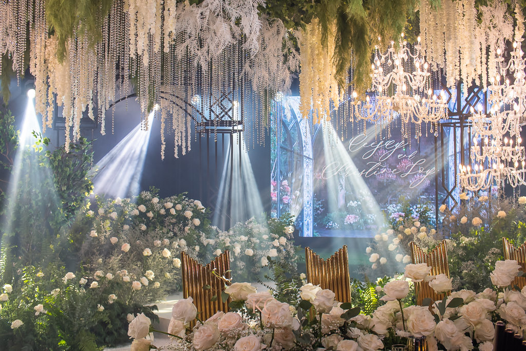 florals and lush greens rustic elegance wedding reception of Ceejay and Christine stage flowers and ceiling works by Khim Cruz