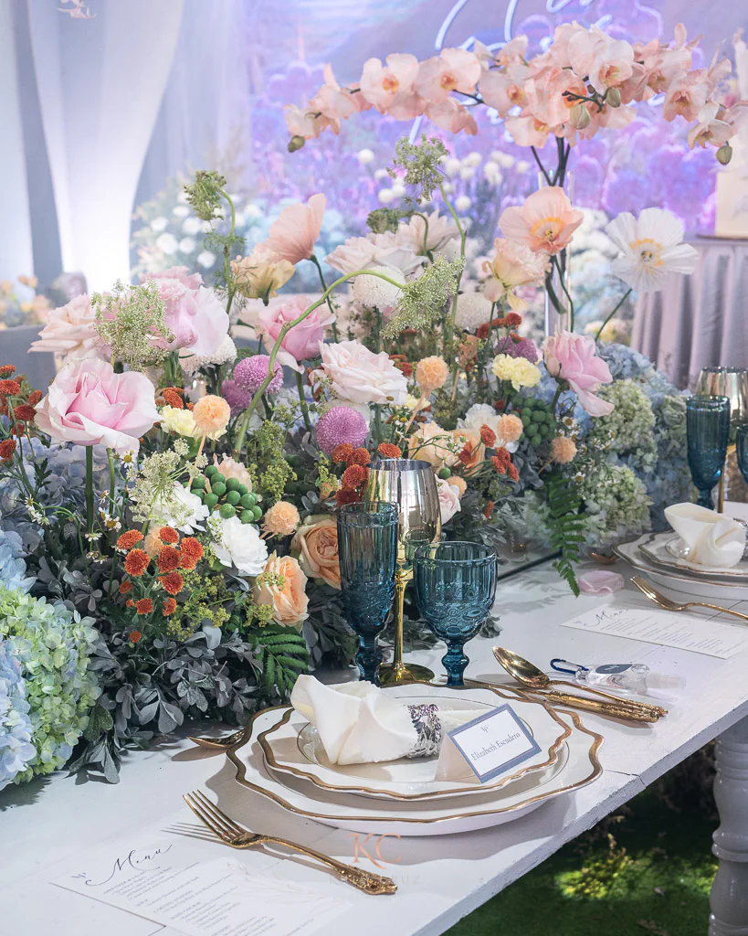 a modern-feel garden themed wedding reception floral table setting centerpieces for Arvin and Patricia by Khim Cruz