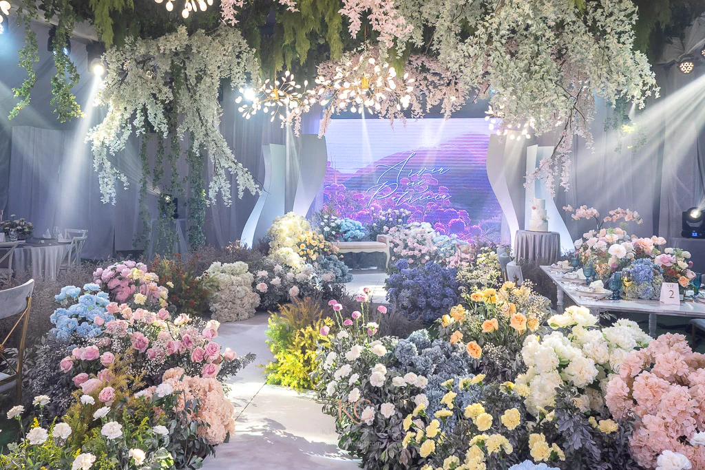 a modern-feel garden themed wedding reception floral walkway for Arvin and Patricia designed by Khim Cruz