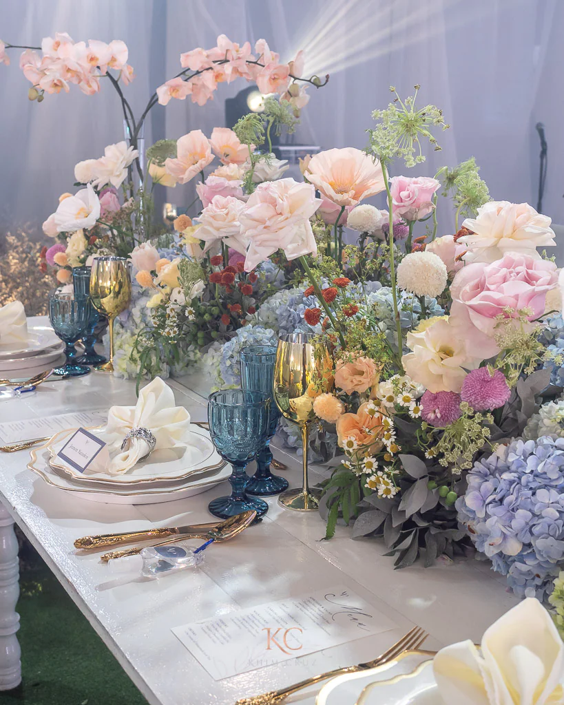 a modern-feel garden themed wedding reception table flowers for Arvin and Patricia by Khim Cruz