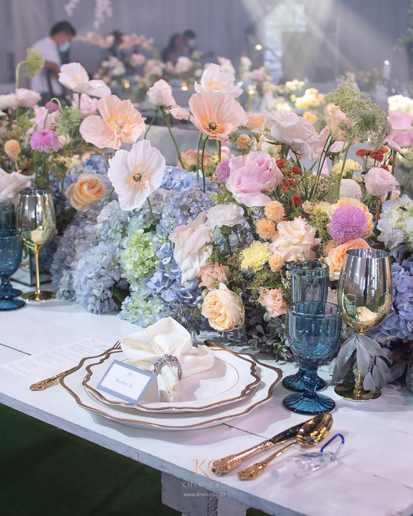 a modern-feel garden themed wedding reception table settings with fine cutleries for Arvin and Patricia by Khim Cruz