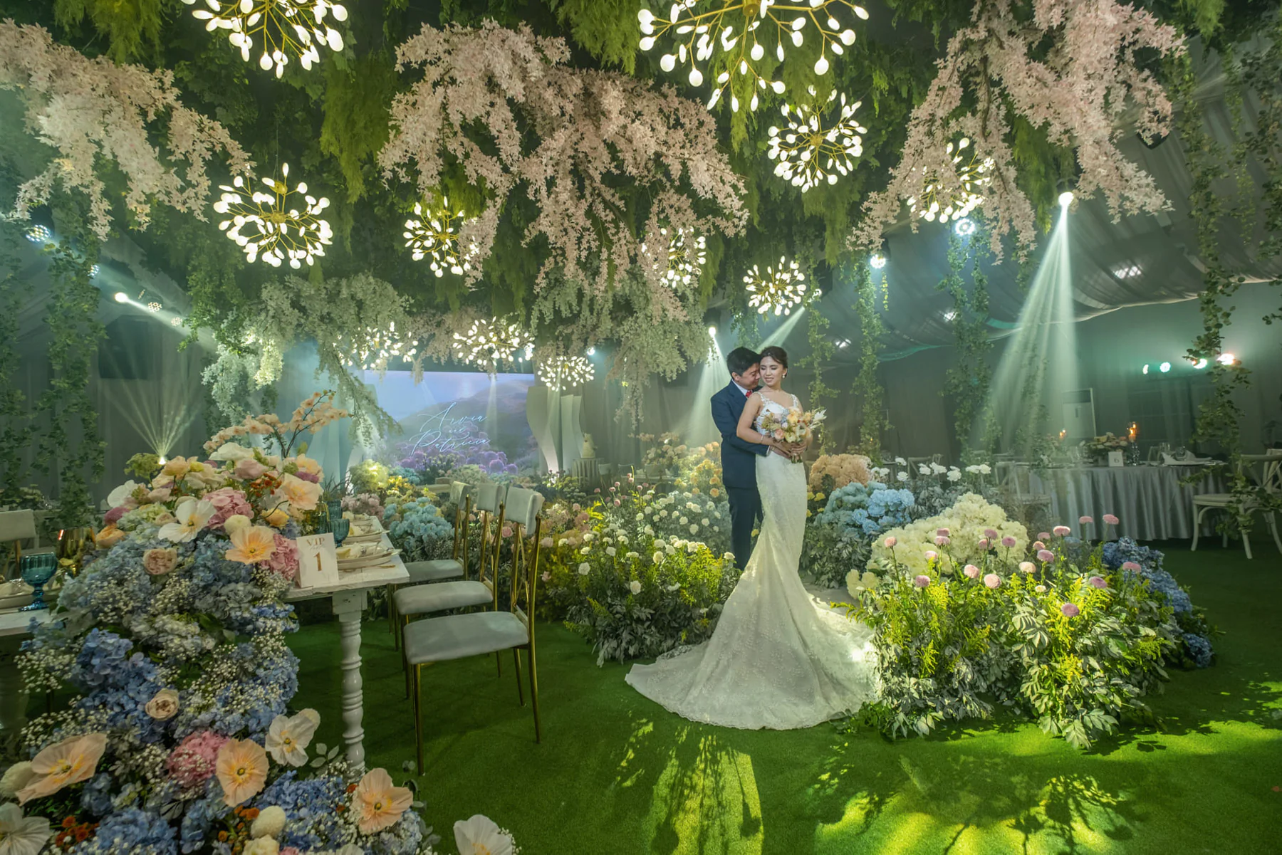 couple on their modern-feel garden themed wedding reception by wedding stylist Khim Cruz