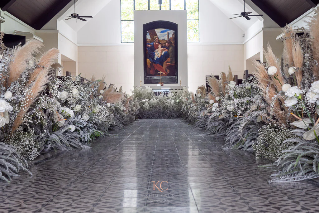 gypsophilas on the wedding ceremony aisle of Bong and Charmaine by Khim Cruz