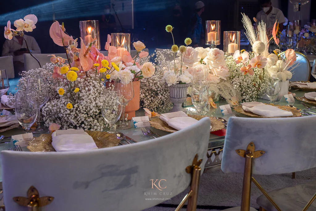 beneath the stars wedding reception for Neil and Mieko table floral centerpieces arranged by Khim Cruz