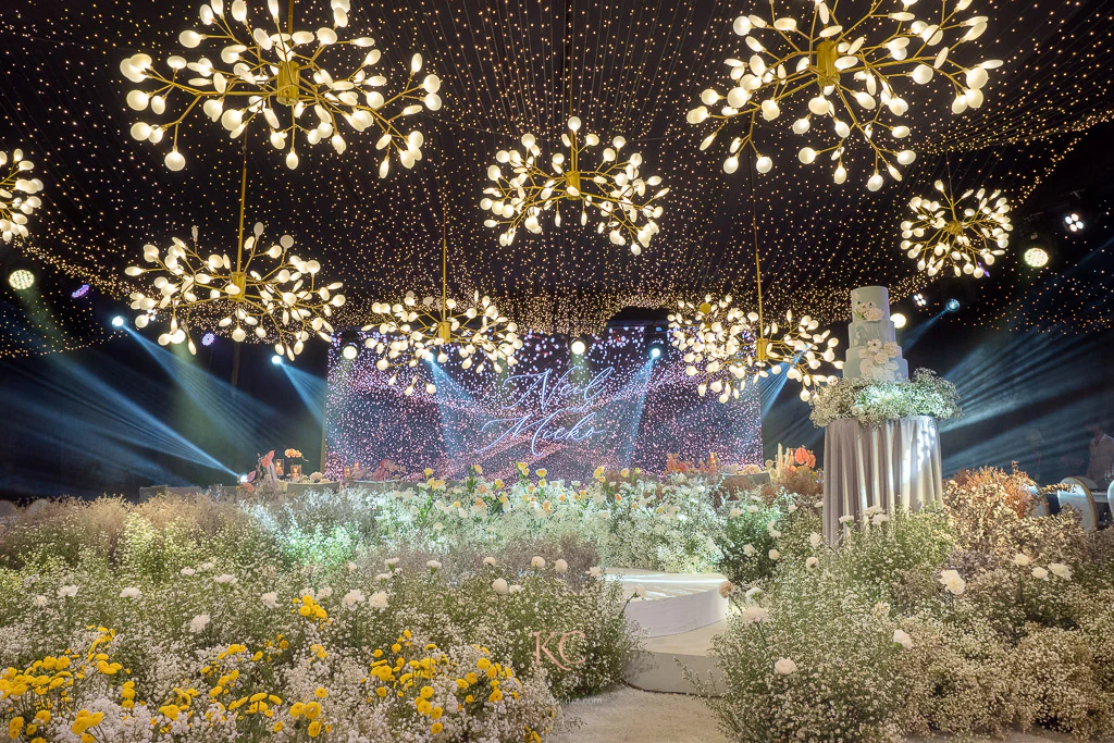 beneath the stars wedding reception for Neil and Mieko with gypsophila filled stage dance floor made by Khim Cruz
