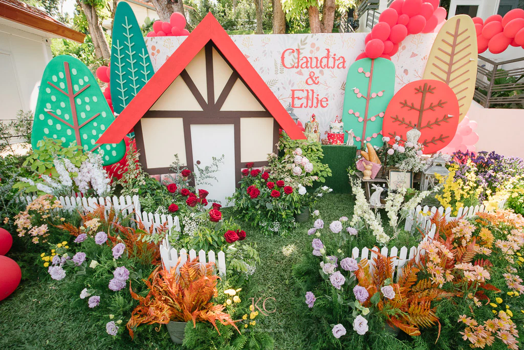 little red riding hood fairy tale grandmas house with flowers on garden by Khim Cruz