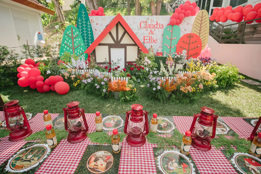 little red riding hood grandmothers house in front of children's table