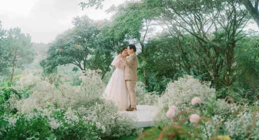 an outdoor 10th wedding anniversary renewal of vows ceremony with Pher and Iah dancing on stage designed by Khim Cruz