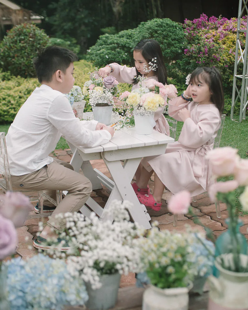 daughters of 10th wedding anniversary couple making their flower girl baskets