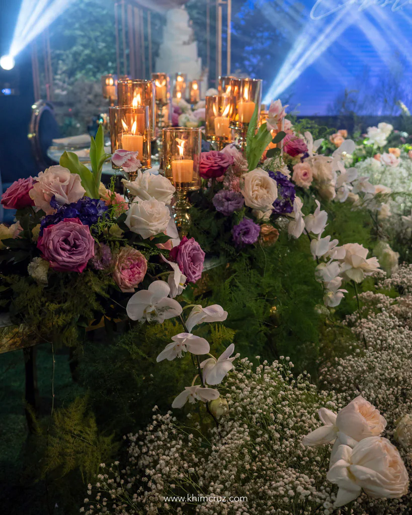 chic forest themed wedding reception floral details gypsophila phalaenopsis roses