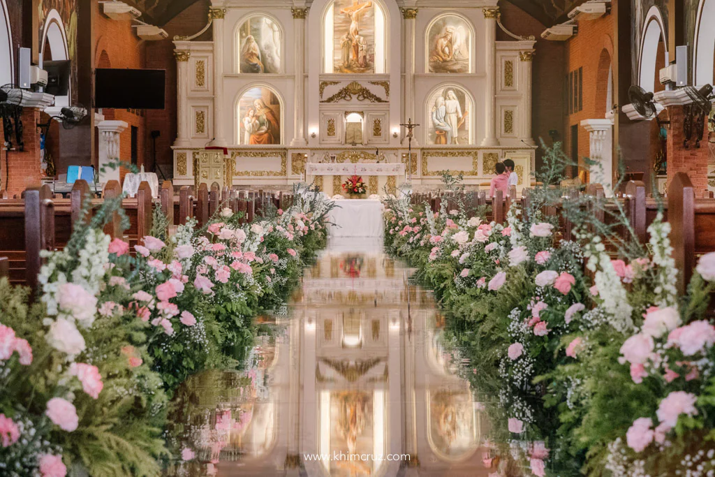 wedding ceremony setup for Anthony and Myka with over 140 feet long floral arrangement along the mirror panels