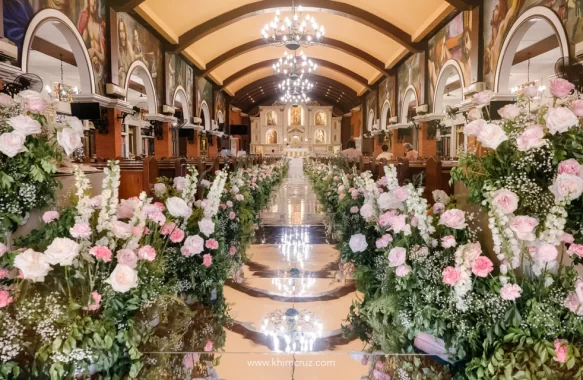 wedding ceremony setup for Anthony and Myka with over 140 feet of floral arrangement along the mirror panels