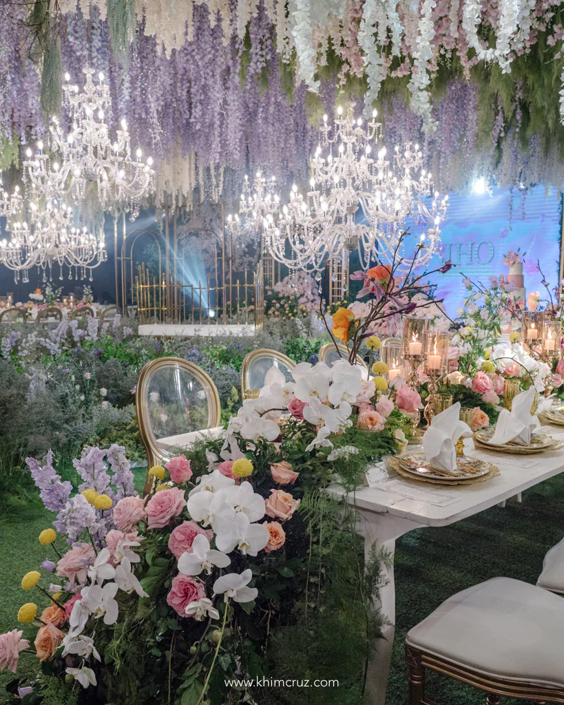 Jho's 50th birthday table setup with cascading florals French garden design by Khim Cruz