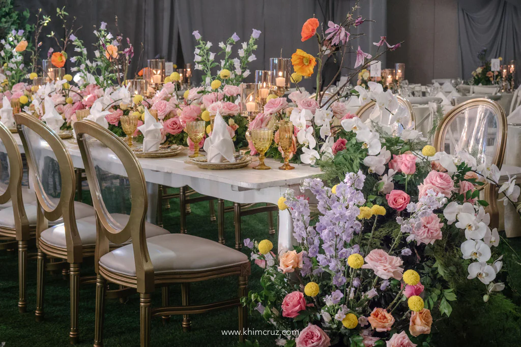 Jho's 50th birthday table setup with cascading florals French garden design