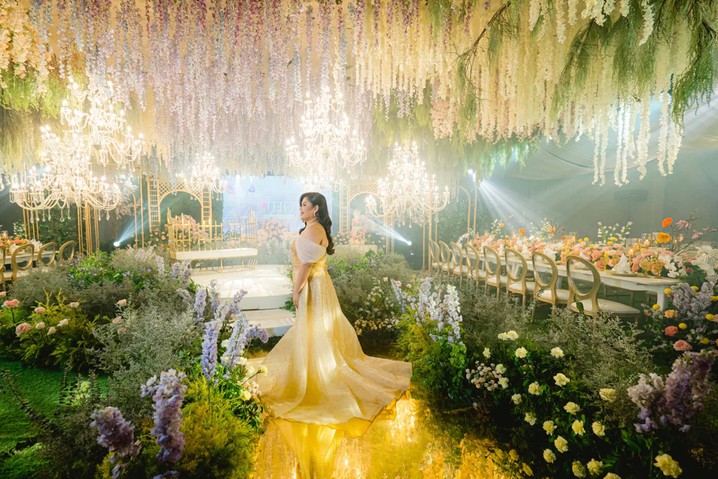 celebrant Jho on her 50th birthday celebration on a French floral garden ballroom designed by Khim Cruz
