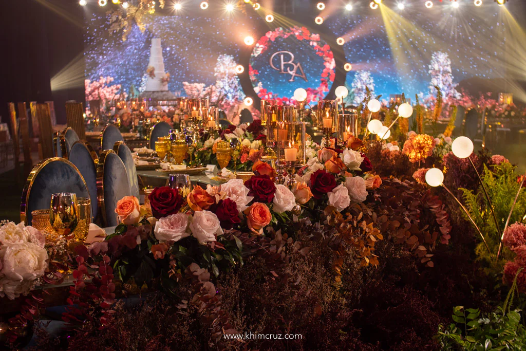 Autumn-inspired floral centerpieces on the table for a wedding reception