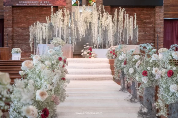 beautiful white and red wedding aisle and stage backdrop design by Khim Cruz