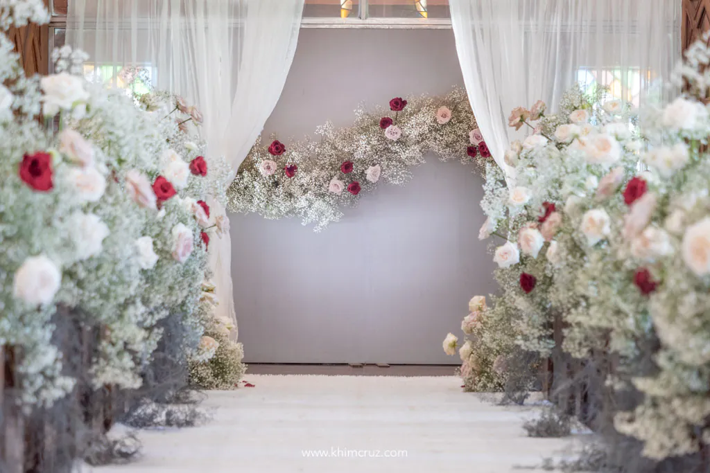 beautiful white and red wedding ceremony entrance backdrop