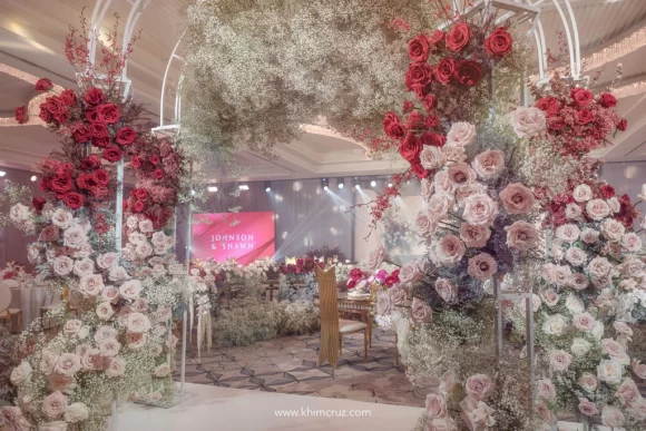 modern elegance wedding of Johnson and Shawn floral entrance arch designed by florist Khim Cruz