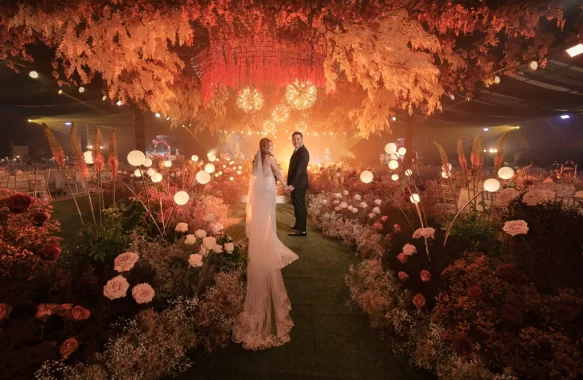 autumn-inspired wedding of Bruce and Alyssa bride and groom walking down the pathway designed by Khim Cruz