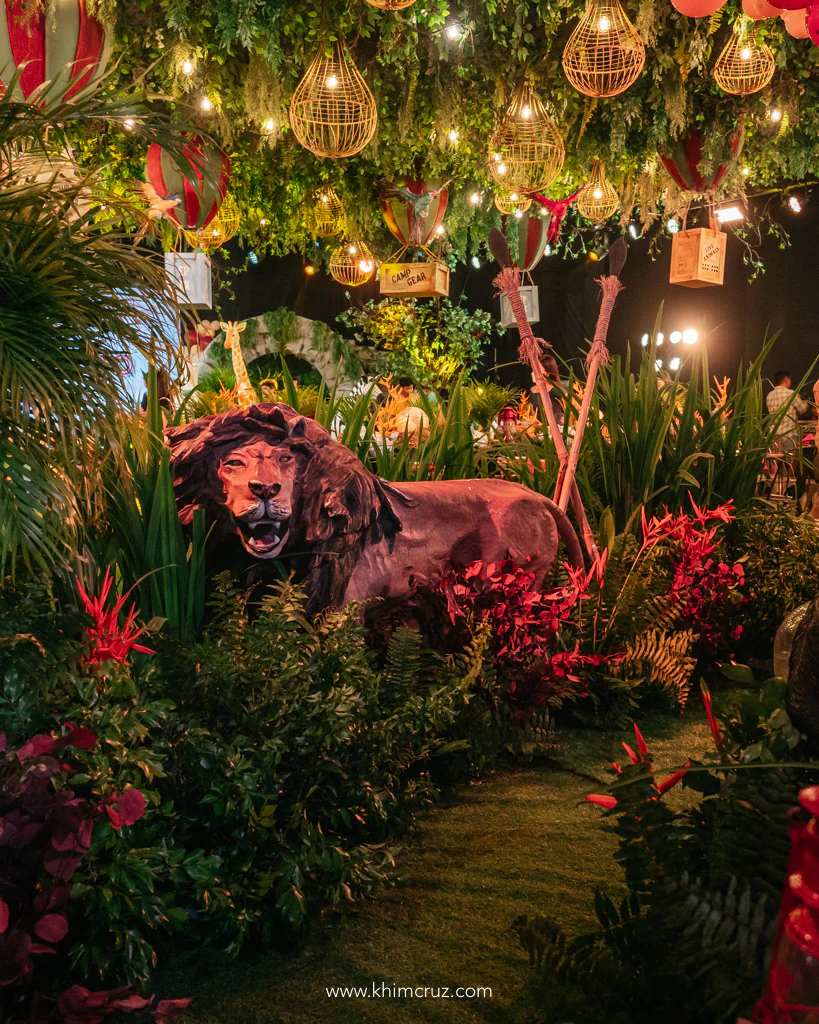 safari expedition themed birthday party entrance pathway with safari animals