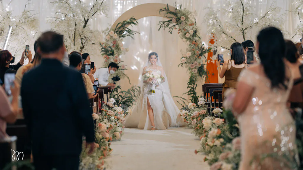 elegant wedding ceremony of Plong and Glaiza as bride walks down the aisle styled by Khim Cruz
