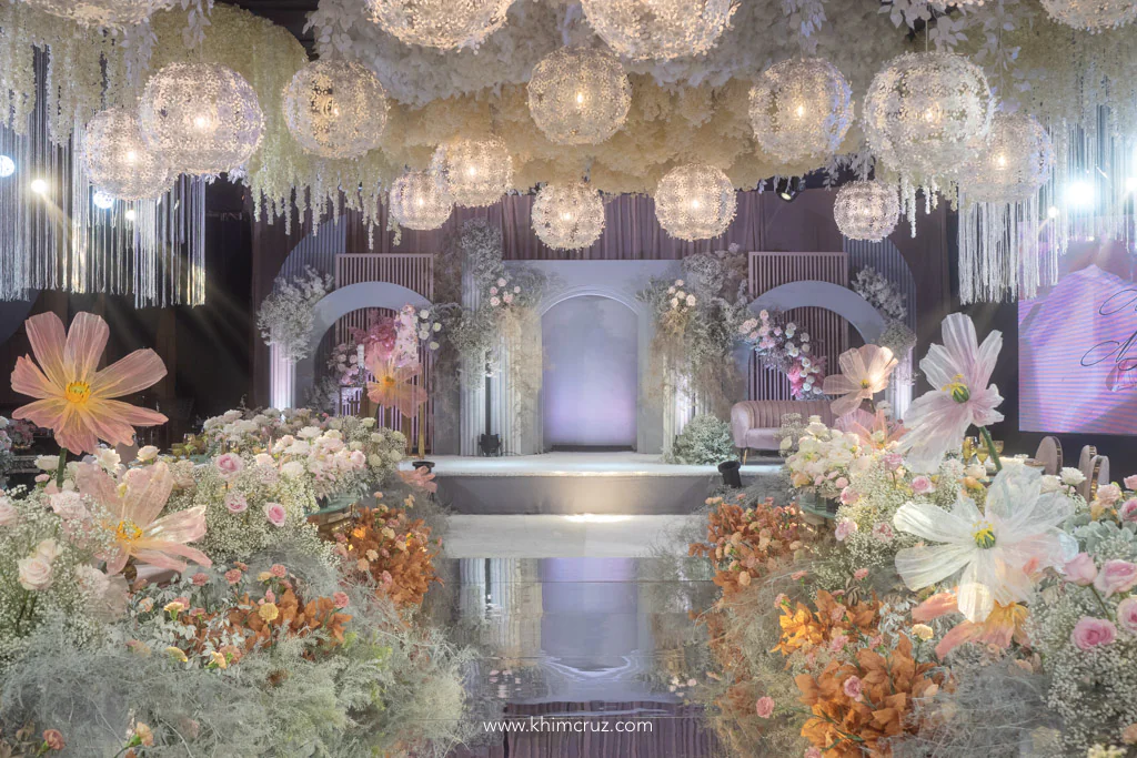 dreamy debut of Brandie and Brielle stage backdrop and ceiling works mirror floral aisle walkway by Khim Cruz