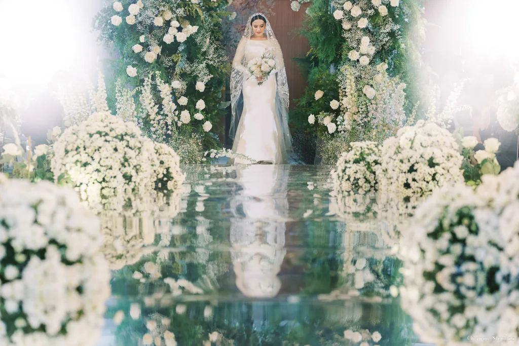 Nikah wedding ceremony of Datu Pax Ali and Bai Shari bridal entrance carrying bouquet